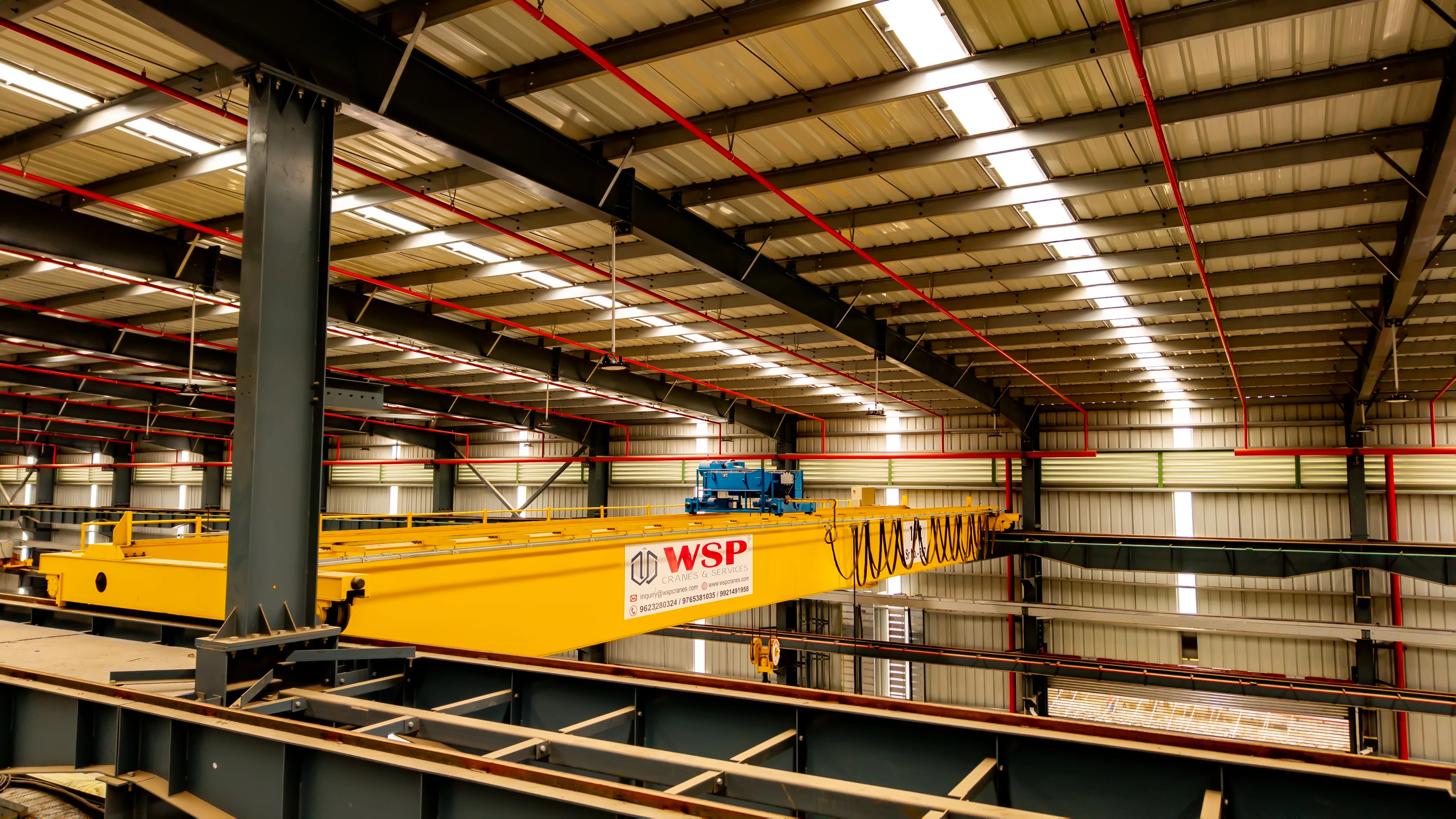Under running double girder EOT crane for constrained spaces